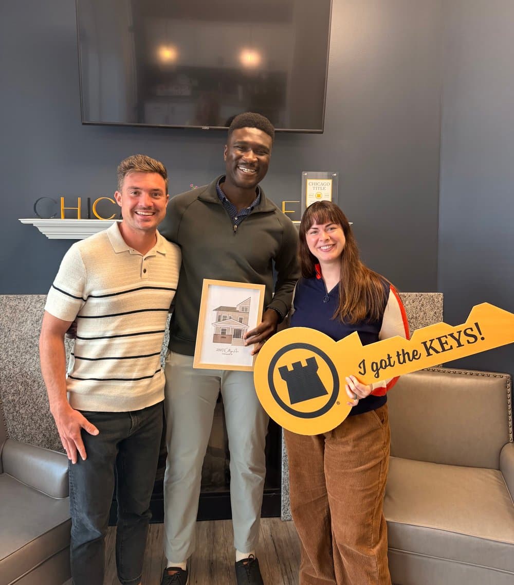 Tyler Lingle celebrating closing day with buyer clients in Indianapolis
