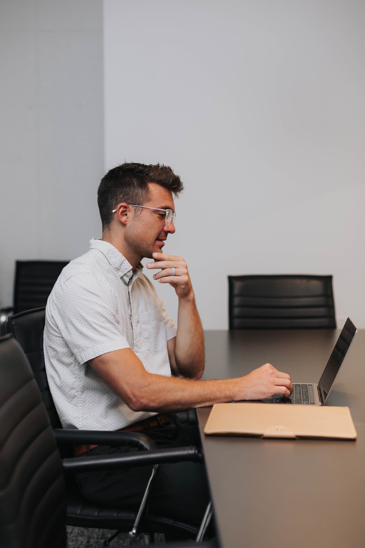 Tyler Lingle underwriting an Indianapolis rental deal at his laptop