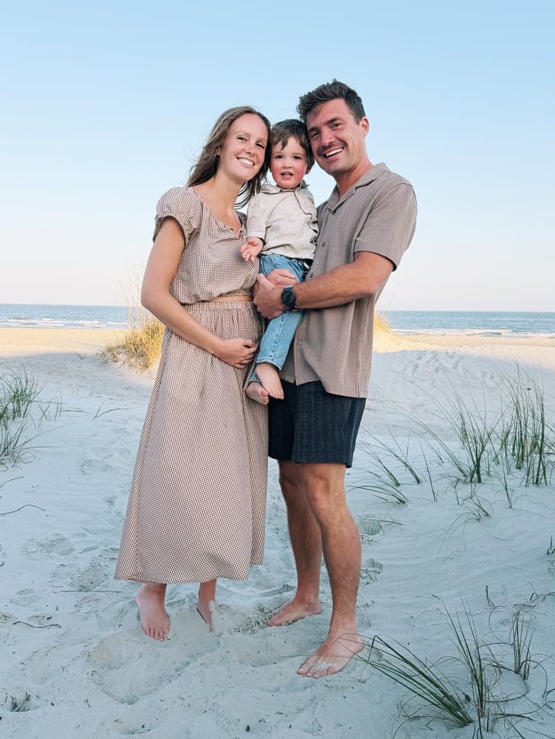 Tyler Lingle with his wife and son at the beach